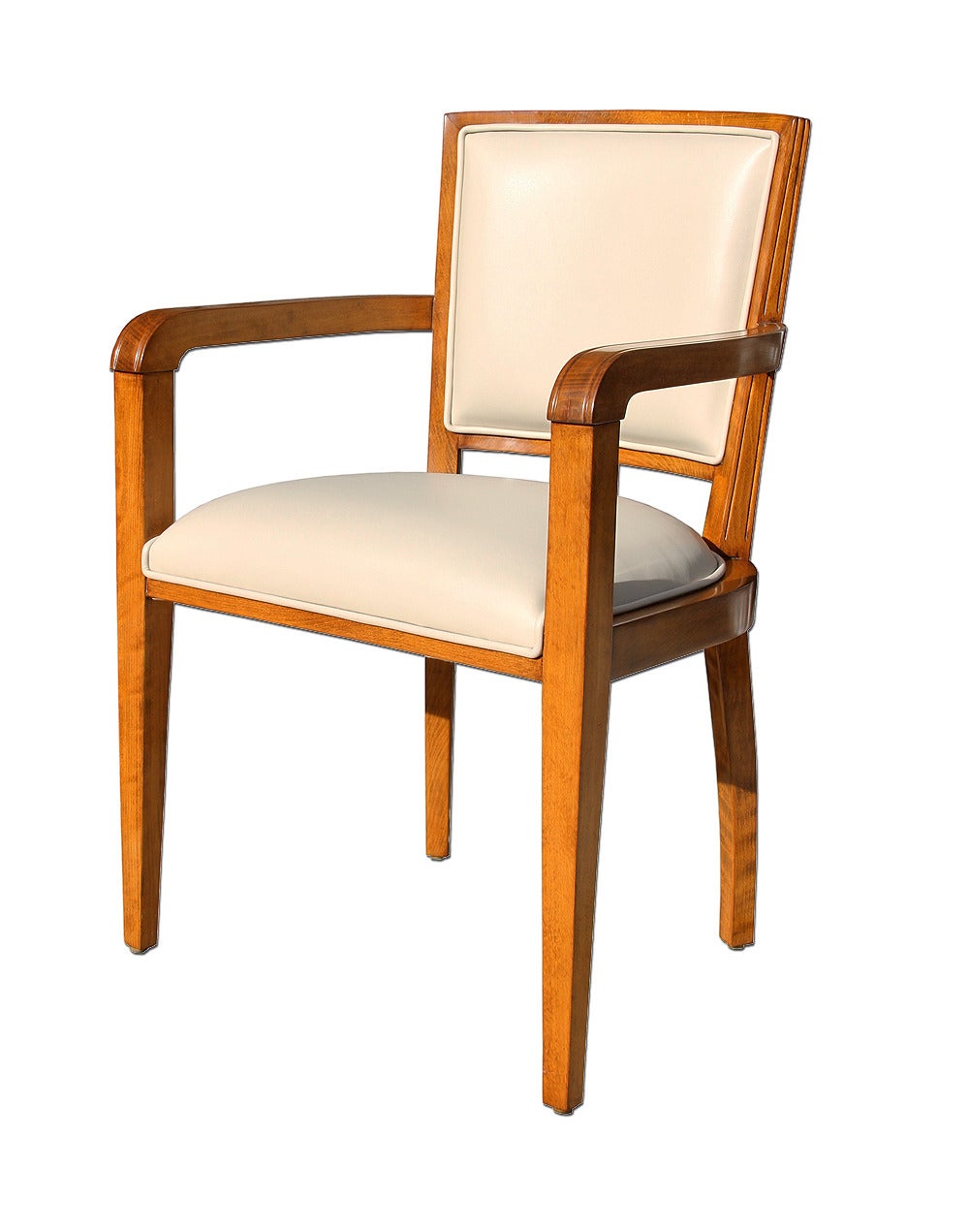 One beautiful 1940s era Art Deco desk chair from French Governmental Institute.

This beechwood Art Deco chair has been beautifully refinished with a natural satin varnish and wax and reupholstered with a natural cream off-white leather. The