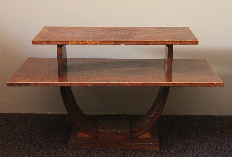 Jules LELEU (1883-1961)
Very rare and fine Art Deco two-tiered rectangular burled amboyna veneer side table by Jules Leleu, France, circa 1930.
The table is stamped.

H.22