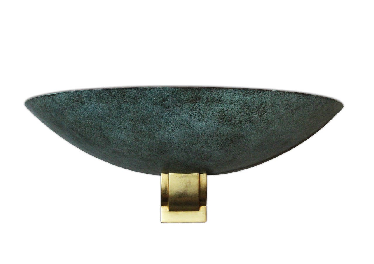 Very rare and important large sconce attributed to Perzel.
We have a set of seven but we split six + one.
This price is for one, the set of six is also listed on 1stdibs.
The metal shade is lacquered in green or black cloudy tones outside and