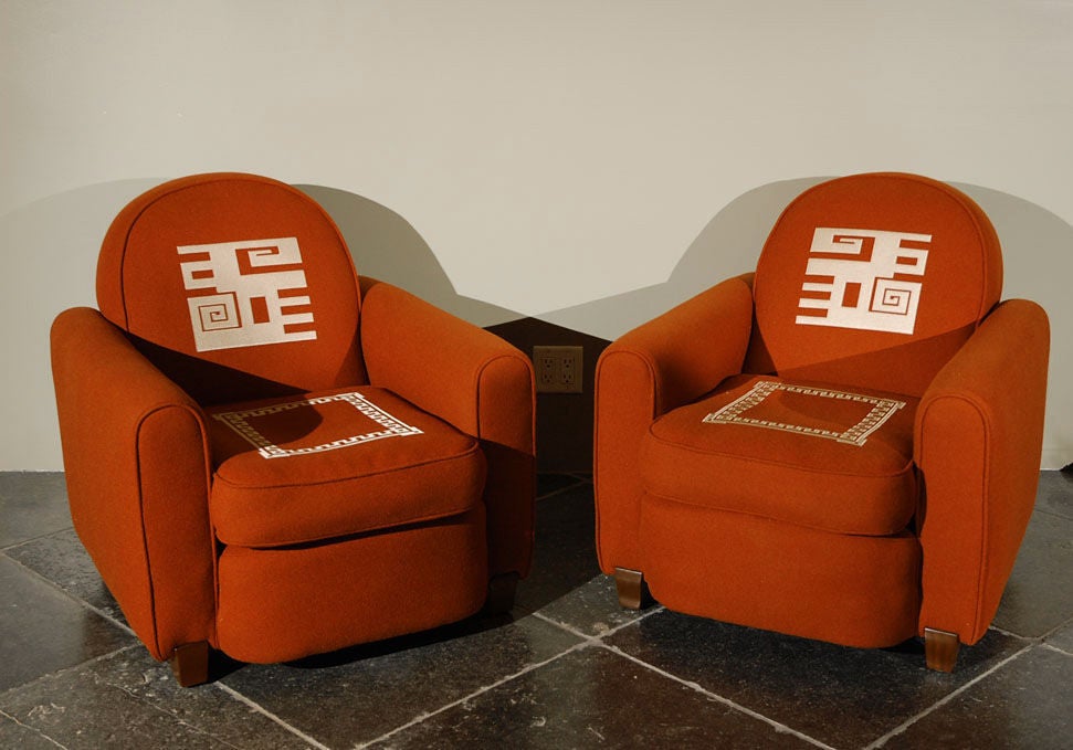 Jules LELEU ( 1881-1961 )<br />
<br />
Two very confortable chairs in a burnt orange wool fabric, france circa 1936. <br />
Model n° 80343 - signed, stamped and numbered. <br />
<br />
Dimensions: <br />
Chair - H: 30