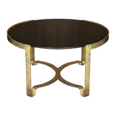 1940 Gilt bronze and black glass circular coffee table