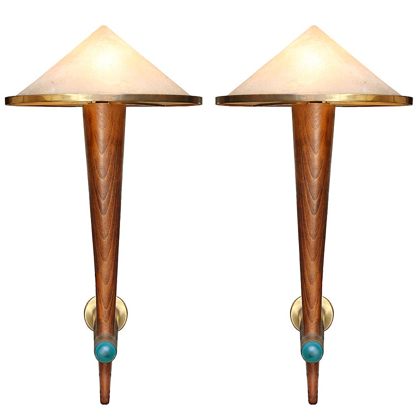 This price is for a set of 4, but these sconces can be purchased by the pair as well. Altogether we have 10 sconces from an original set of 16.
From the Cafe Francais in Paris, France circa 1970.

The sconces are in beech wood, bronze, and brass.