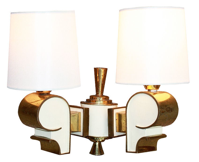 Philippe GENET & Lucien MICHON - France

This original pair of gilt and lacquered bronze lights comes from one of the most prestigious hotels in Paris, the Prince de Galles.


The custom made silk shades are new and not original. The shades