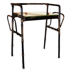 Jacques Adnet, rare leather rack table