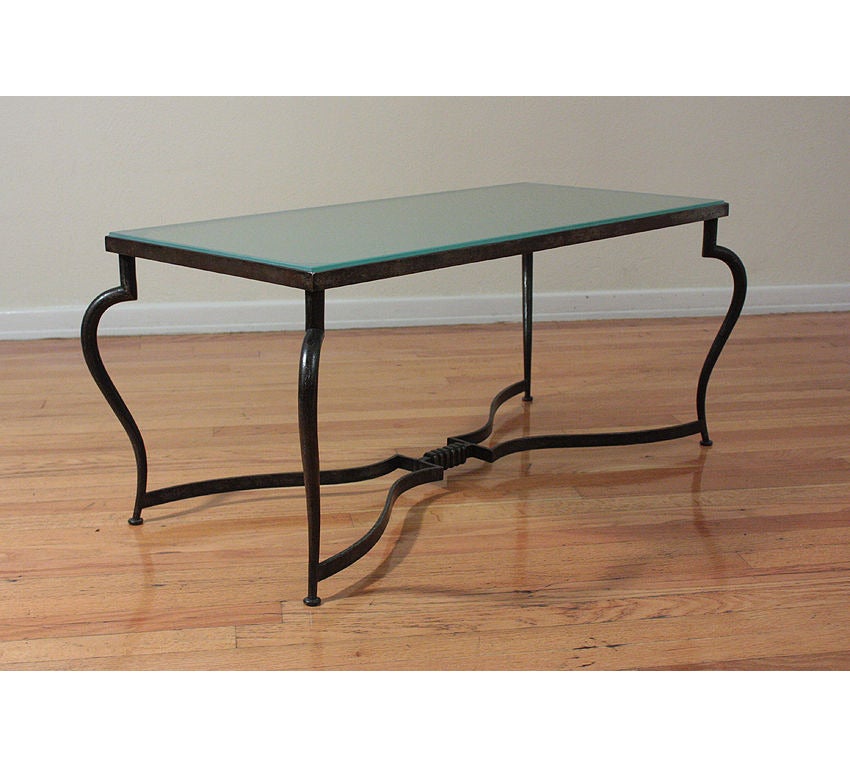 Michel Zadounaisky (1903 - 1983)

Very rare 1930 Art Deco patinated wrought iron table with a frosted glass top.

An elegant and sophisticated model for a coffee table providing delicateness, simplicity, and class to any interior decor and