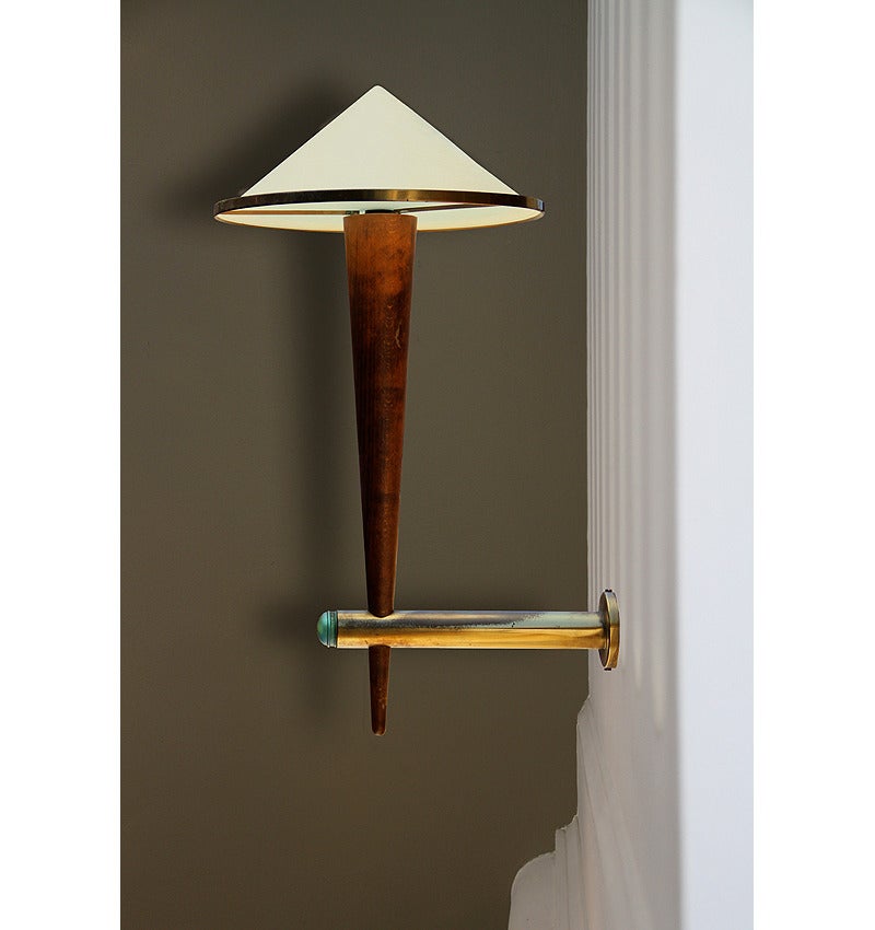 Sold as a pair. Altogether we have 14 sconces, from an original set of 16, one pair has sold recently.
From the Cafe Francais in Paris, France, circa 1970.

The sconces are in beech wood, bronze and brass with frosted glass conic shades and