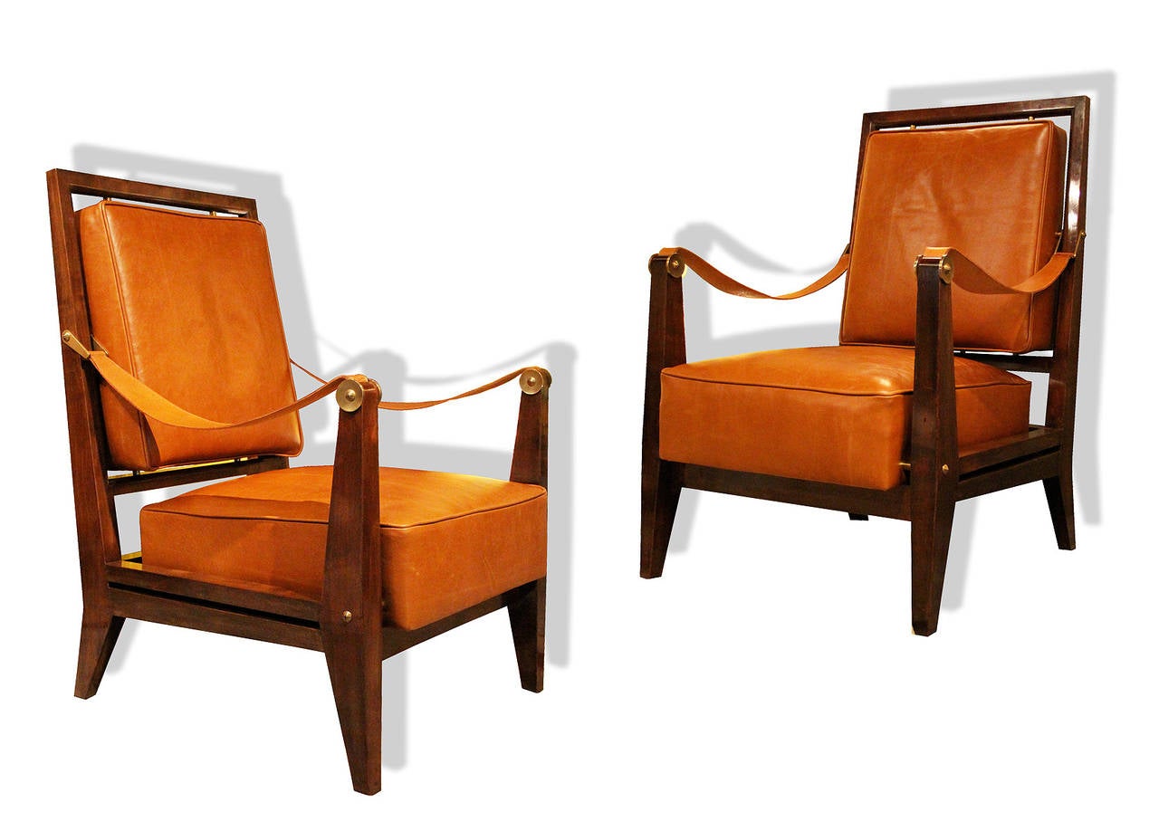 MAXIME OLD (1910 - 1991)

Pair of Chairs from the Marhaba Hotel, France 1953

Extremely rare pair of Maxime Old chairs. Fully re-upholstered in new camel hued leather.
The wood bases are in their original condition. The arms retain their
