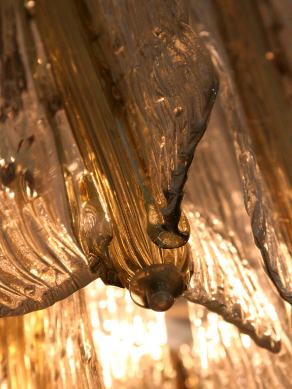 This twenty-one panel chandelier is large in scale and ribbon effect features a rare touch
Designed by Toni Zuccheri.