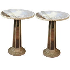 Pair of mirrored reverse painted pedestal tables