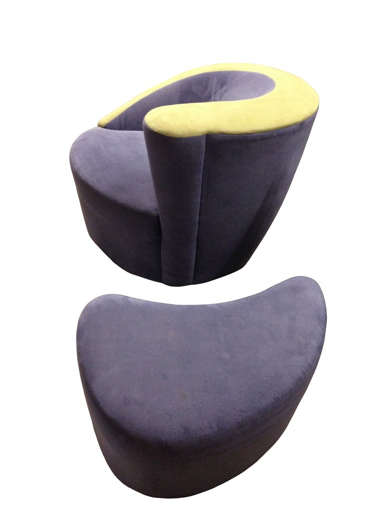 Nautilus armchair and ottoman designed by Vladimir Kagan and manufactured by Directional.
The chair swivels and the ottoman has casters so is easy to move around, they are upholstered in a purple/lavender microfiber fabric with the chair having a