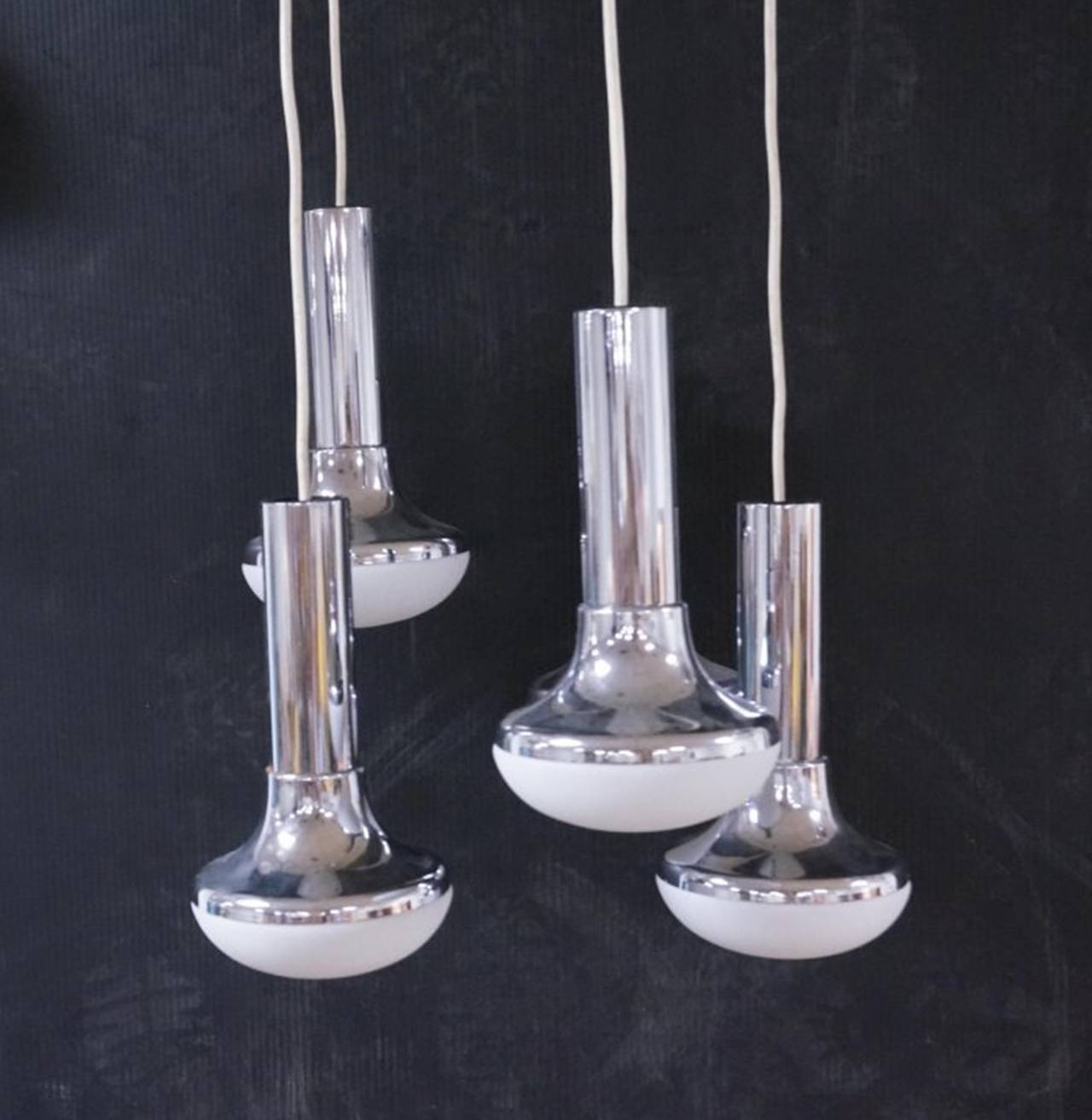 Beautiful chandelier executed in chrome and glass.
Excellent original condition ready to be displayed.

Dimensions: H: 44 inches: W: 20 inches: D: 20 inches.

If you are coming to our showroom to see a piece please call ahead of time because