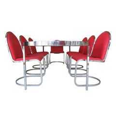 1970's Expandable Chrome and Glass Dining Table and 8 Chairs