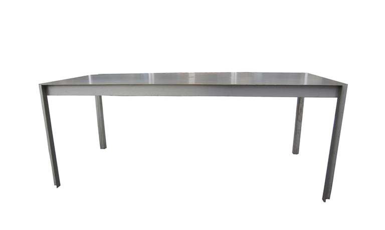Wonderful vintage raw steel dining or desk table.
The table can easily seat 8-10 people, it is heavy solid steel with great architectural lines.
The table has some rust spots which give it a real cool industrial look but we can also have it