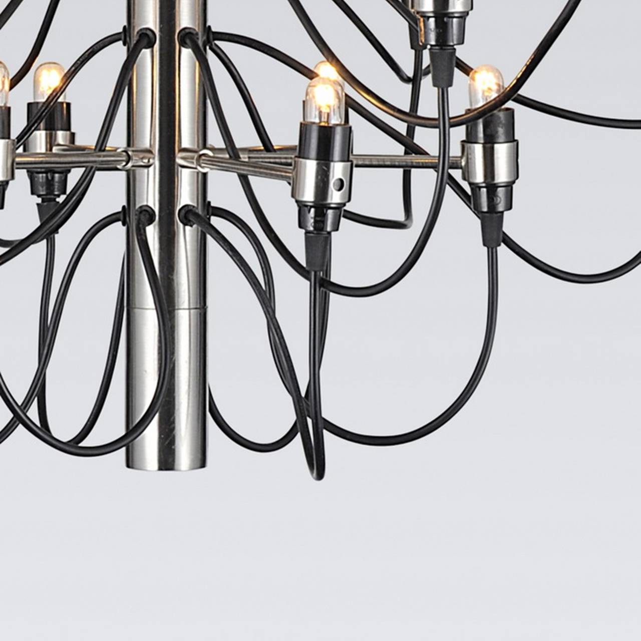 Beautiful light fixture designed by Gino Sarfatti and manufactured by Flos.
The piece is in very good original condition and fully functional.

Measurements:
Chandelier only: 29