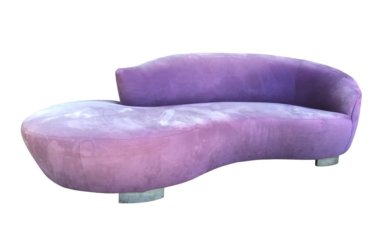 Beautiful serpentine sofa designed by Vladimir Kagan and manufactured by Preview.
The sofa has curved body which makes it very sexy and yet very comfortable, the main body seats in stainless steel crescent shaped bases and is upholstered in a
