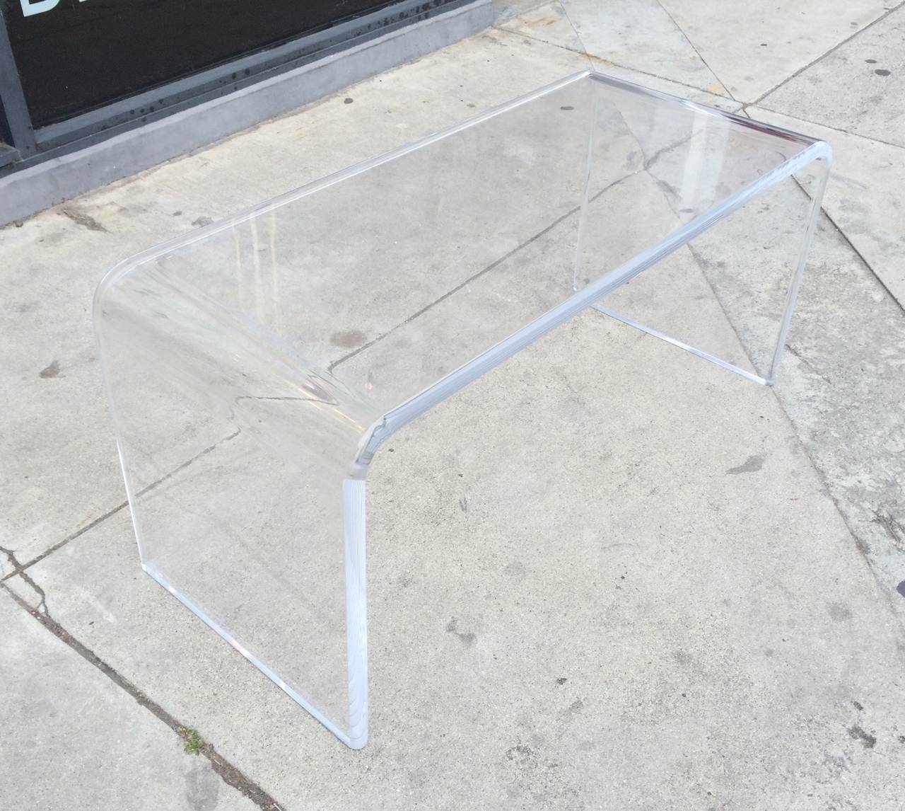 lucite waterfall coffee table