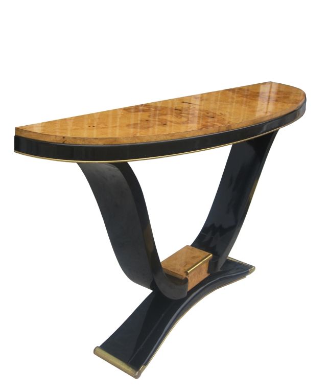 Beautiful French deco console with a burl wood top and black lacquered base with brass accents.<br />
The table comprises of a V shaped lacquered vase topped with a high gloss lacquered finish burl wood top.<br />
The bottom of the console is