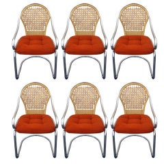 Six Freestanding Dining Chairs in Chrome and Wicker