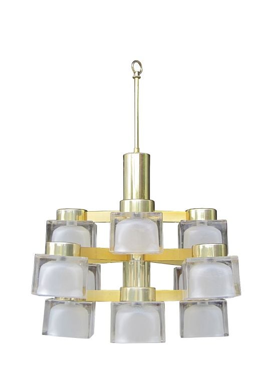 A Lightolier chandelier by Italian lighting designer Gaetano Sciolari, featuring twelve (12) 
