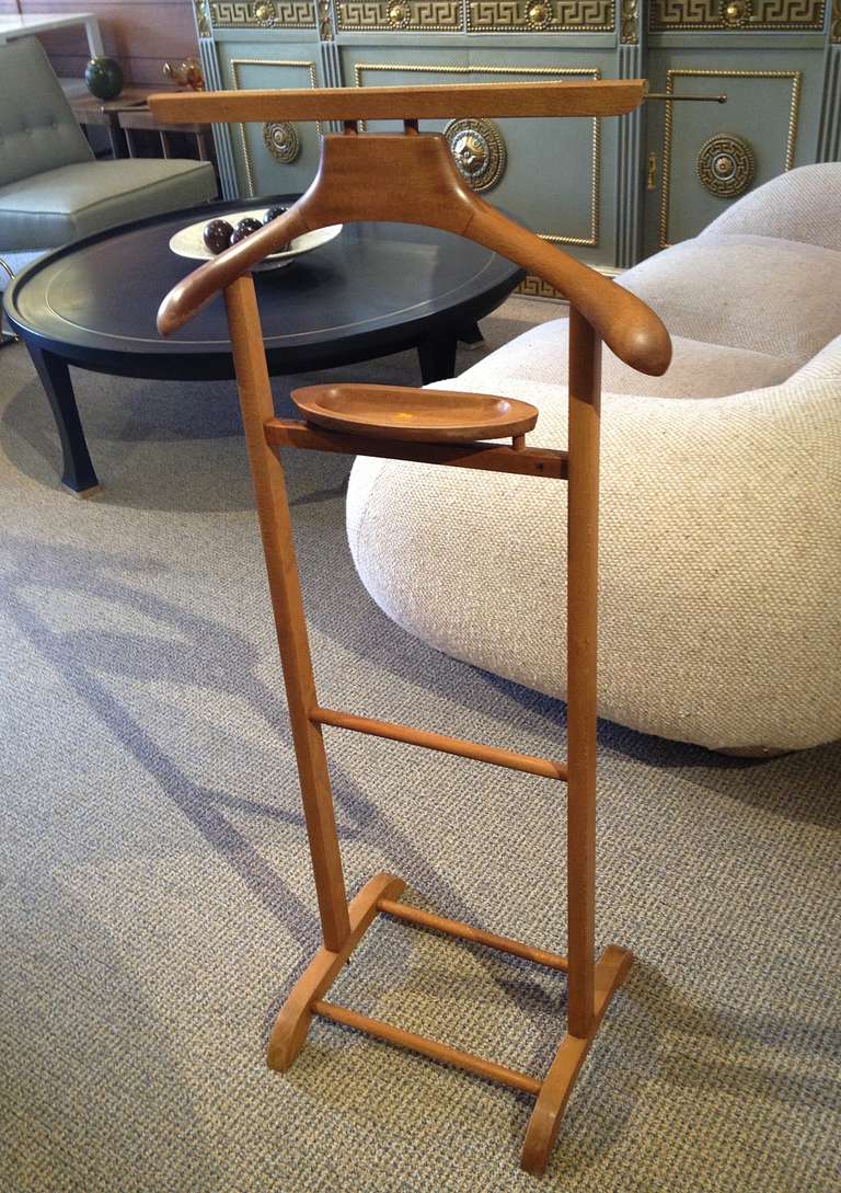 Beautiful vintage Italian valet signed S.P.Q.R. manufactured in the 1950's and in good original condition.
The valet comes has a show rack, a tie holder a key/change tray pants holder and everything to make sure your suit doesn't get