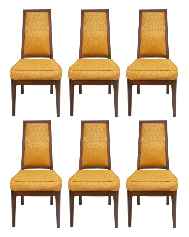 Beautiful set of Cal Mode dining chairs by Kipp Stewart . Made of solid walnut, these elegant chairs are perfect for the mid-century dining room. The chair are wonderfully proportionate. They are in original condition. In order to reveal their