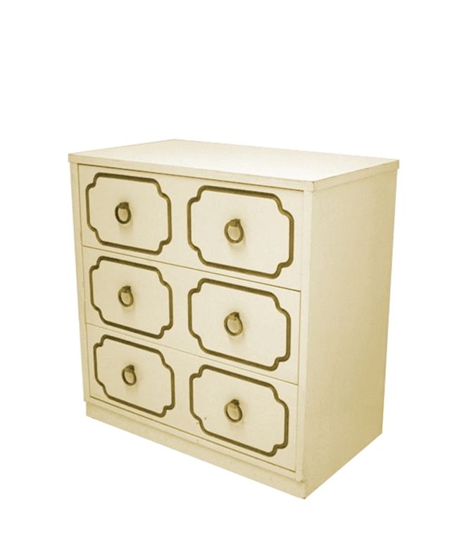 Beautiful Dorothy Draper chest of drawers in cream lacquer, gold leafing accent and brass hardware.
The cabinet has three deep drawers with plenty of storage space, the brass hardware gives it a more sophisticated look.

The piece is in need of
