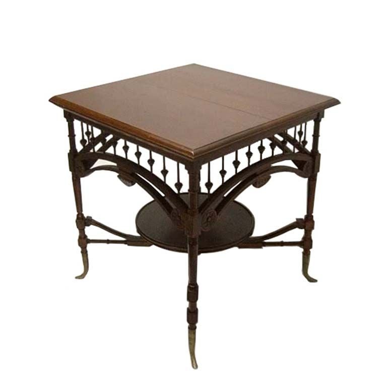 1800s English Carved Mahogany Table with Brass Legs