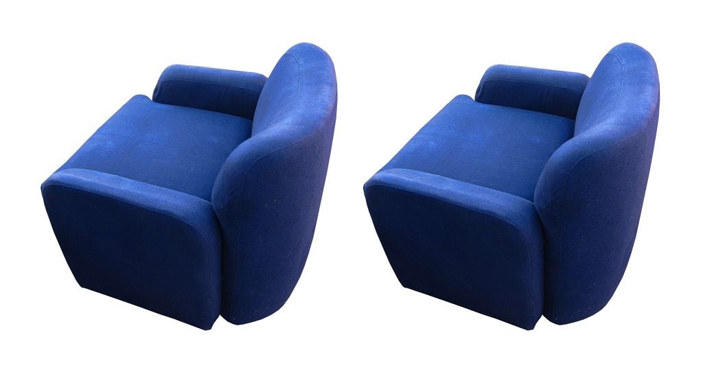 Beautiful petite swivel chairs upholstered in a blue fabric.
The chairs are extremely heavy for their size, they seat on a swivel base which is chrome banded.
The chairs have great proportions but they seat low, so they are great for shorter