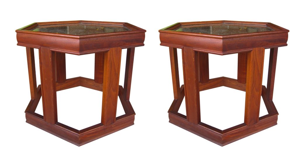 Set of two 1960s octagonal tables designed by John Keal for Brown & Saltman. Crafted in walnut, these tables feature a resin finish over stone colored paint, creating incredible depth.
Use them as end tables, or combine them to make a coffee table.