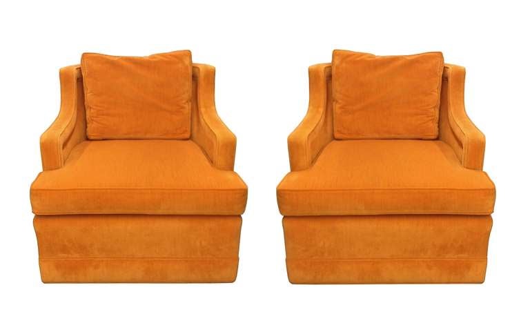 Beautiful pair of armchairs designed by Edward Wormley and manufactured by Dunbar. Six are available.
These chairs are very comfortable, they are generous in size and have rollers for easy movement; the fabric is original bright yellow velvet and