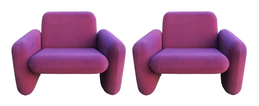 Designed by Ray Wilkes for Herman Miller in 1976 this chairs have it all - great lines with minimalist appearance and comfort you rarely see in modern furnishings. Sitting in one of these is simply a joy.
The chairs are upholstered in a purplish