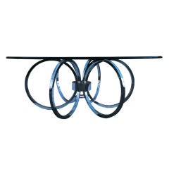 Whimsical Coffee Table with Chrome Rings Base and Glass Top