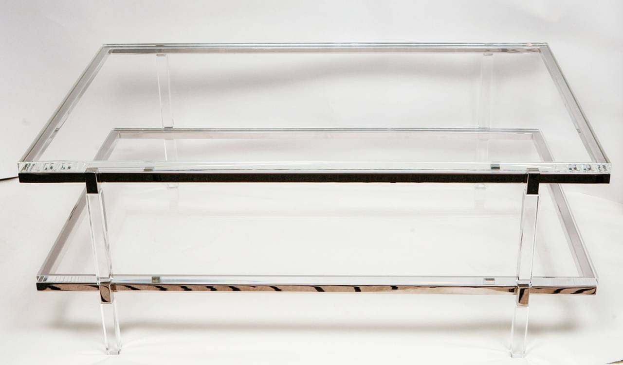 Two level coffee or cocktail table designed and manufactured by the Icon of Lucite Charles Hollis Jones as part of the Metric collection designed in the 1960s.

The table is executed in Lucite and nickel topped with a 1