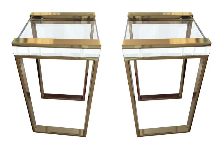 Stunning pair of Lucite and brass side tables designed and manufactured by Charles Hollis Jones as part of his 