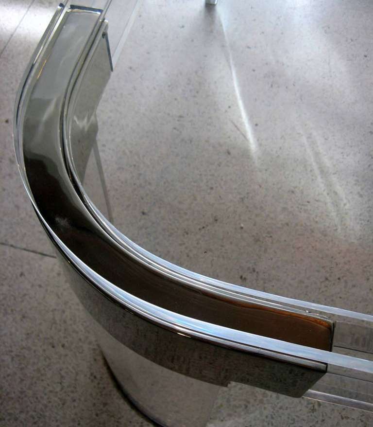 Sleek dining table executed in Lucite and nickel designed in the 1970s by the Lucite icon, Charles Hollis Jones. The table is part of Charles Hollis Jones 