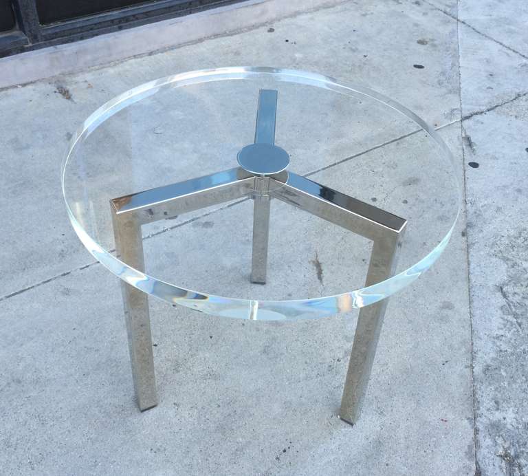 Beautiful pair of Lucite and nickel side tables designed by Charles Hollis Jones for Arthur Elrod. The tables are made out of nickel with a 1 1/2