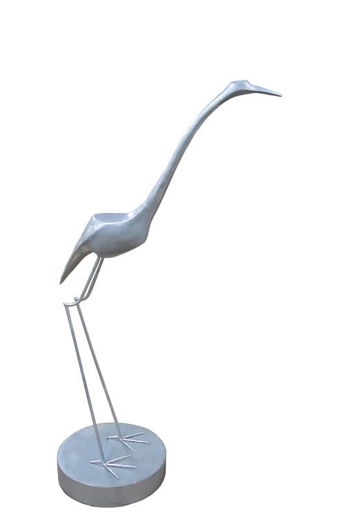Sublime aluminum heron sculpture by C. Jere. The Heron is very delicate in proportions. The sculpture is perched on a metal base. It is quite large. Perfect.
Measurements: 62 1/2