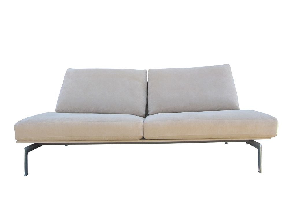 Diesis sofa designed by Antonio Citterio & Paolo Nava in 1979, manufactured by B&B Italia.
The sofa has fantastic architectural lines, the base is constructed of heavy brushed steel with a seat and back made of suede.
The cushions are plush and