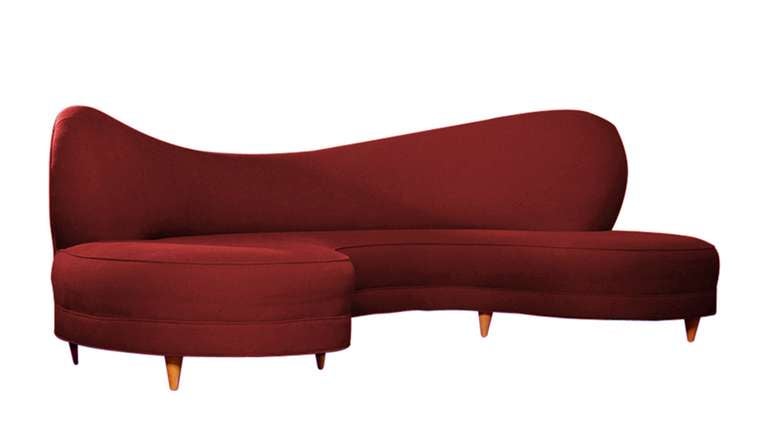 Stunningly large serpentine sofa designed by Vladimir Kagan for Directional.
The sofa is currently being reupholstered and we may be able to do COM.

The sofa is structurally sound and very comfortable, the sofa rests in conical legs made of