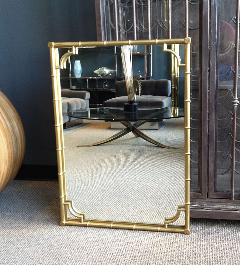 Stunning solid brass wall mirror with a faux bamboo frame, the mirror is in very good vintage condition, nice aged patina and ready to be displayed.

Measurements: 33.5