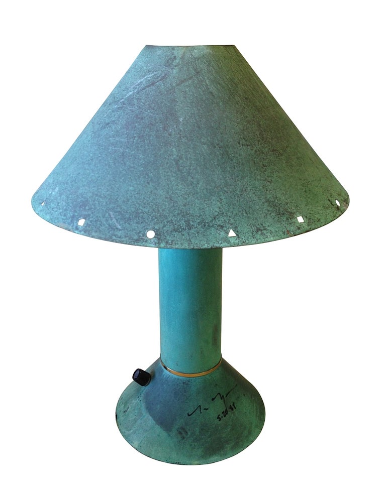 Very rare Ron Rezek table lamp executed in Copper with a verdigris finish.
The table is a beautiful example of Ron Rezek's work and is amazing to have found one that is actually hand signed and dated.
The piece is in excellent condition.
The piece