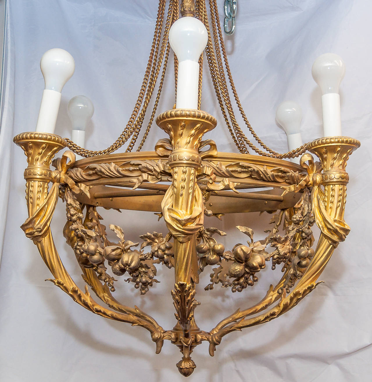 Very fine Louis XVI style bronze six-light chandelier with fruit motif.
Stock number: L184.