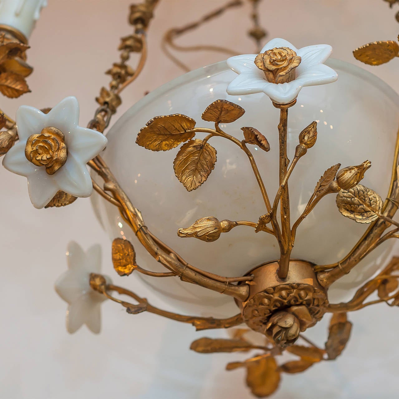 Bronze and porcelain three-light chandelier with porcelain flowers.
Stock number: L318.