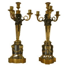 Empire Style Patinated and Gilt Bronze Figural Candelabra Empire Style Patinated and Gilt Bronze Figural Candelabra