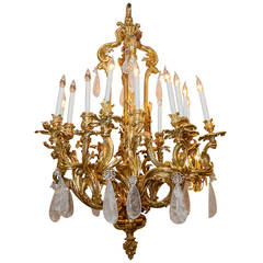 Important Louis XV Style Gilt Bronze and Rock Crystal Sixteen-Light Chandelier
