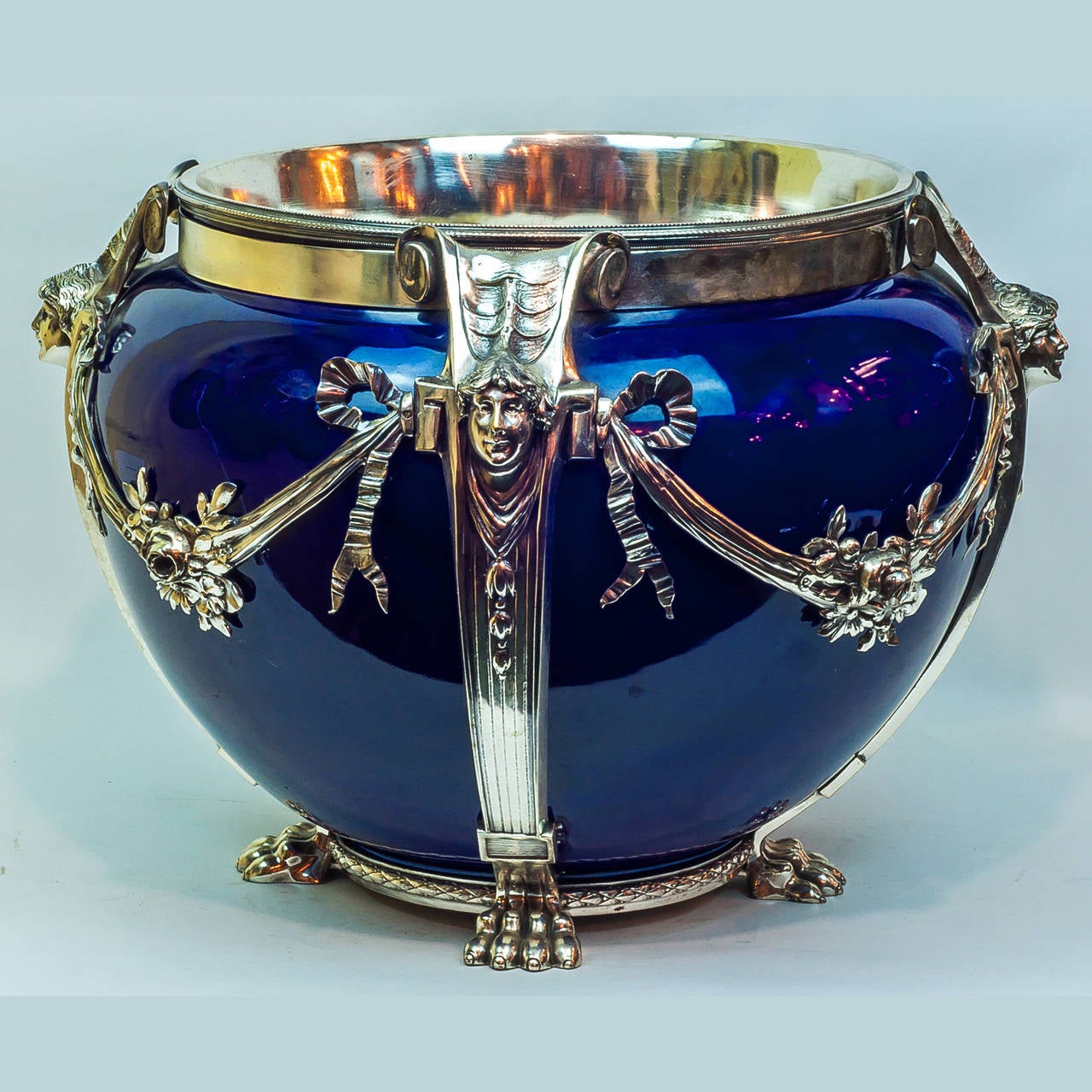 A French silvered bronze and porcelain cobalt blue centerpiece vase.
Stock number: DA25