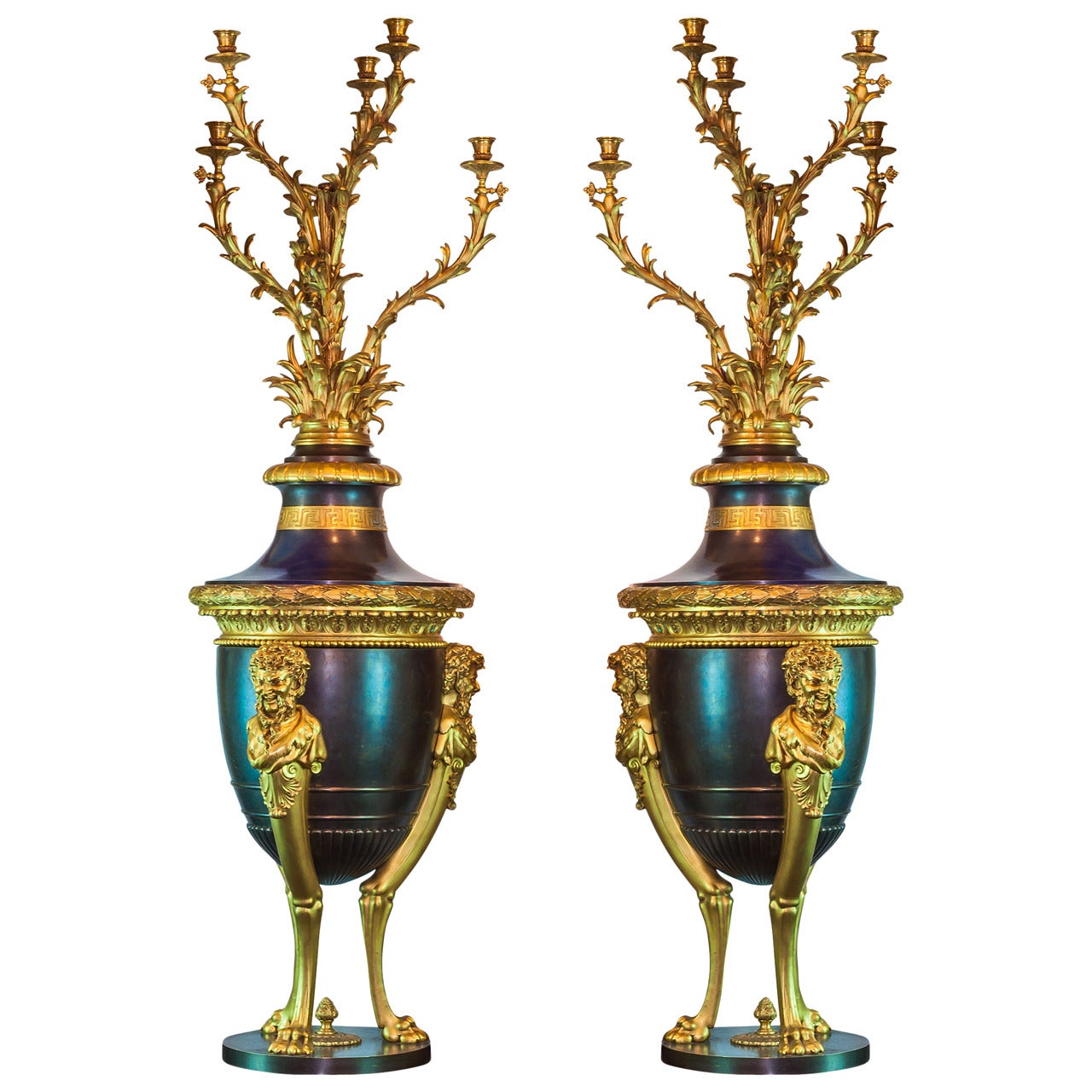 Pair of French Louis XVI Style Patinated and Gilt Bronze Figural Torcheres