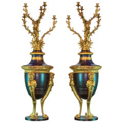 Pair of French Louis XVI Style Patinated and Gilt Bronze Figural Torcheres