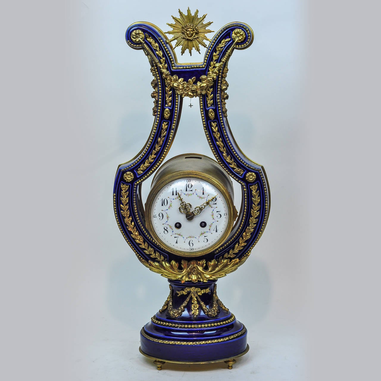 Louis XVI Style Three-Piece Cobalt Blue, Porcelain and Bronze Clock Set 1