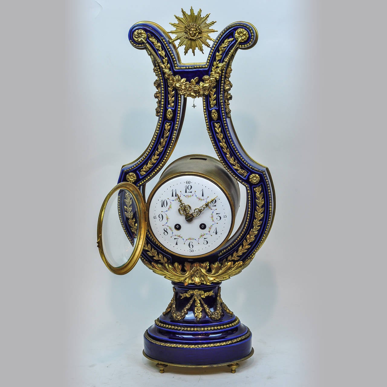 French Louis XVI Style Three-Piece Cobalt Blue, Porcelain and Bronze Clock Set